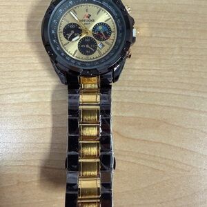 Gold and Black Chronograph Watch